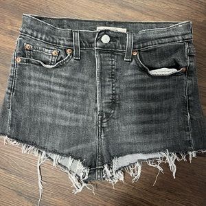 Gray/black Levi’s shorts .